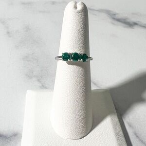 0.61ctw Round Lab Created Emerald Rhodium Over Sterling Silver 3-Stone Ring